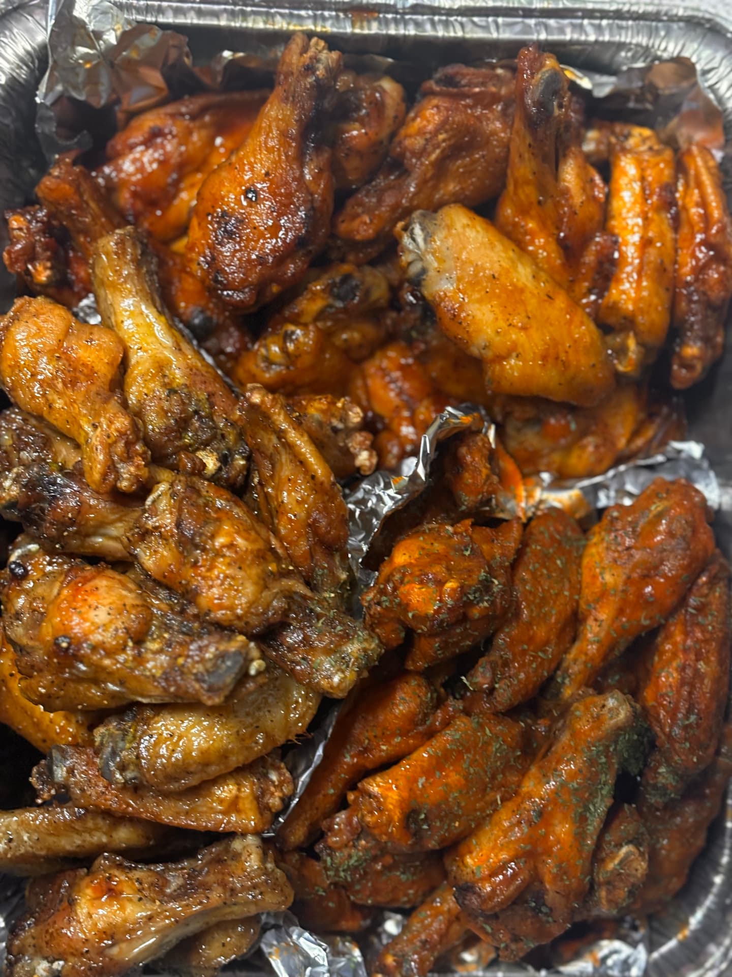 Tray of wings in several flavors, including lemon pepper and hot
